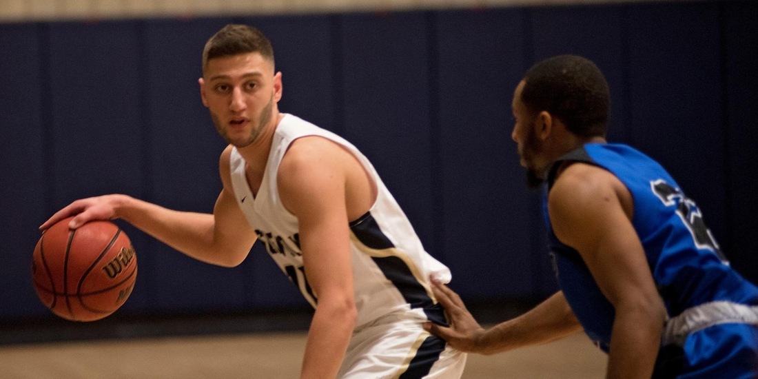 Men’s Basketball Tripped Up On the Road at JWU