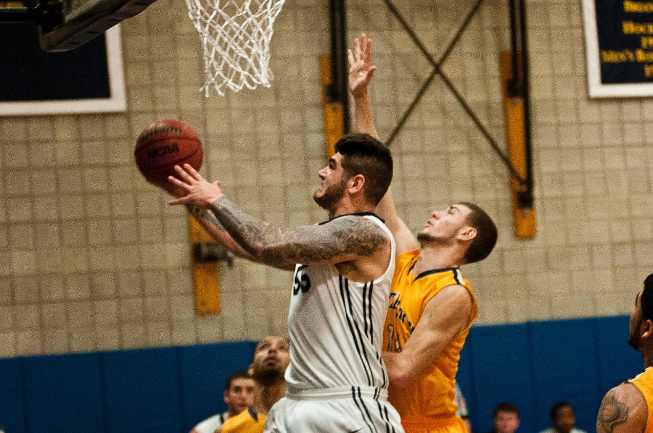 Duquette and Meister Lift Men’s Basketball to 79-72 Win over Emmanuel